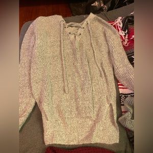 never worn sweater with cross up front